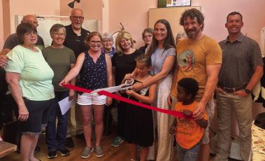 Jenny Greco and The Sewing Room cut the ribbon on a new adventure in Curtis.