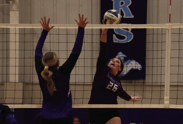 Southern Valley’s Lily Holste puts down a tip kill for the Eagles Monday.