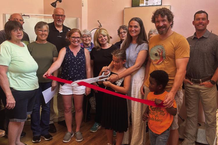 Jenny Greco and The Sewing Room cut the ribbon on a new adventure in Curtis.